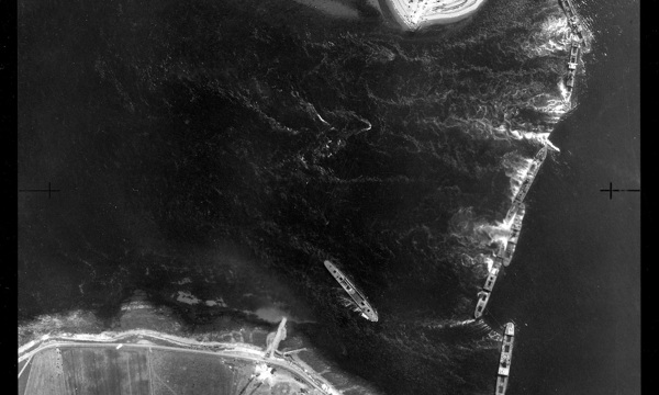 Aerial black and white photo of the Churchill Barriers at Orkney, 1942