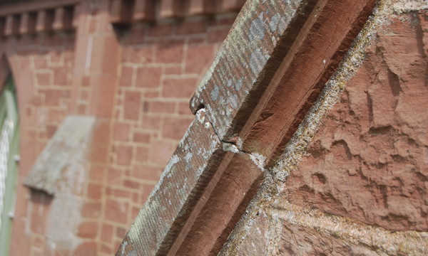 Close up image of the angled edge of a roof