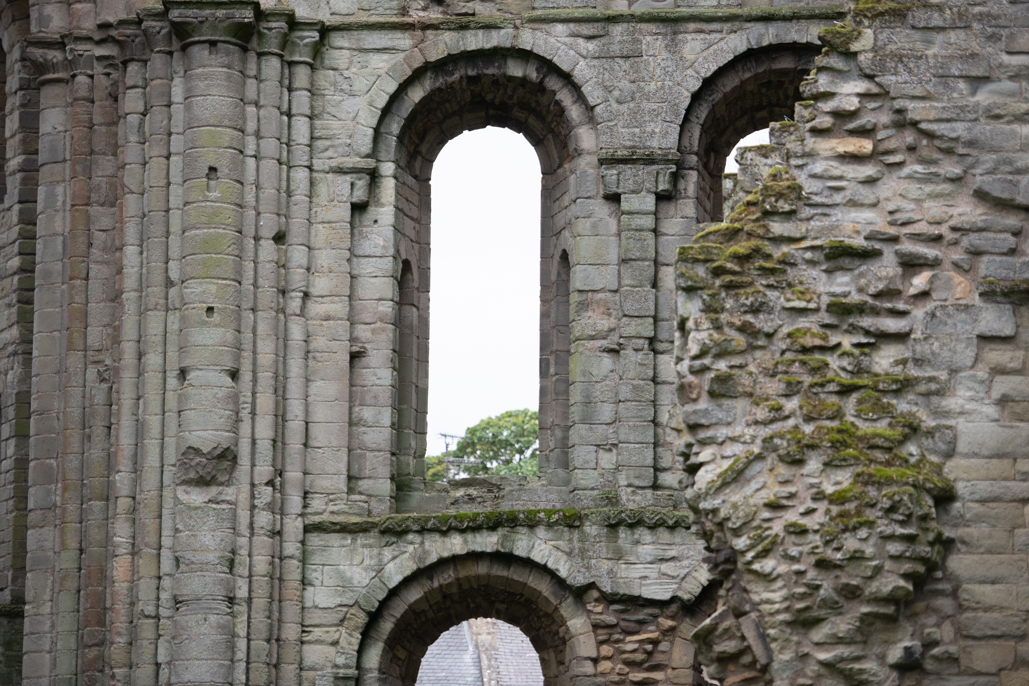 Large, decorative stone window arches