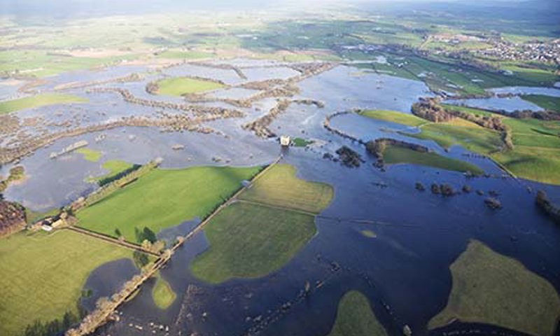 Aerial view of Threave Castle and Estate with surrounding floods