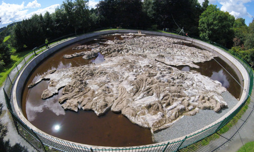 aerial view of a concrete map with a circular fence around the boundary