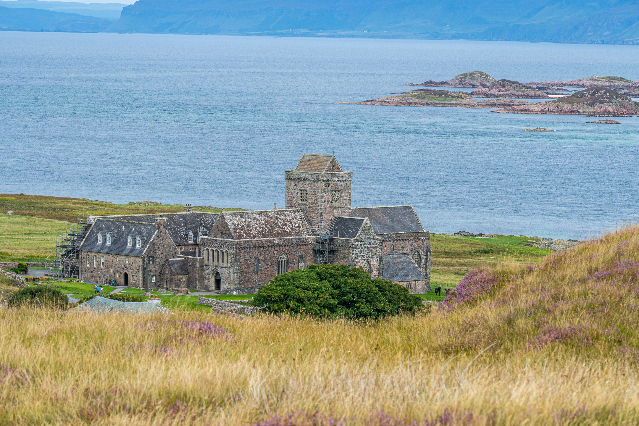 The historic stone Iona Abbey complex, looking out onto the sea