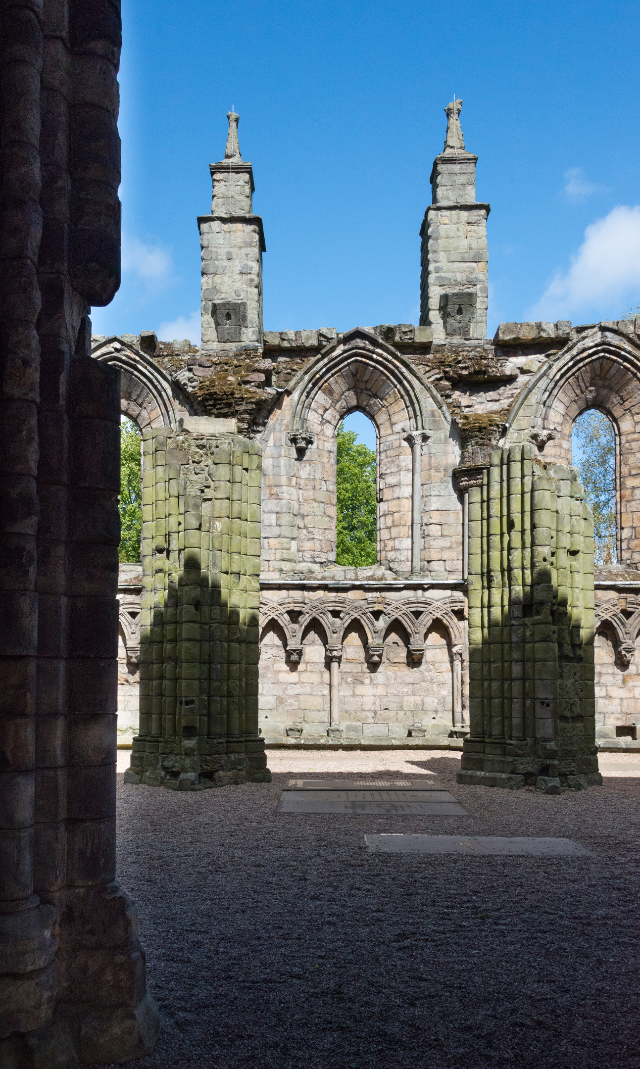 View of detail of the north wall in Holyrood Abbey including stone archways and columns