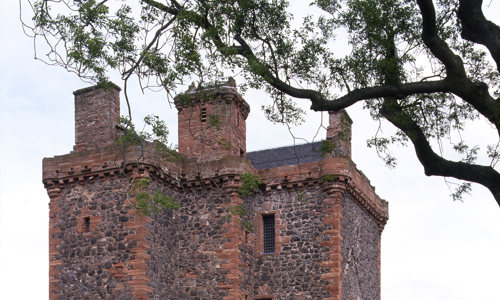 The remarkably complete Balvaird Castle built from grey and red stone