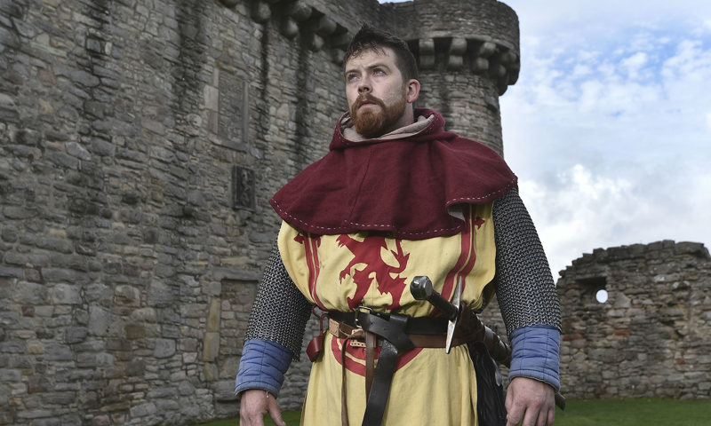 Re-enactor dressed as Robert the Bruce at Craigmillar Castle