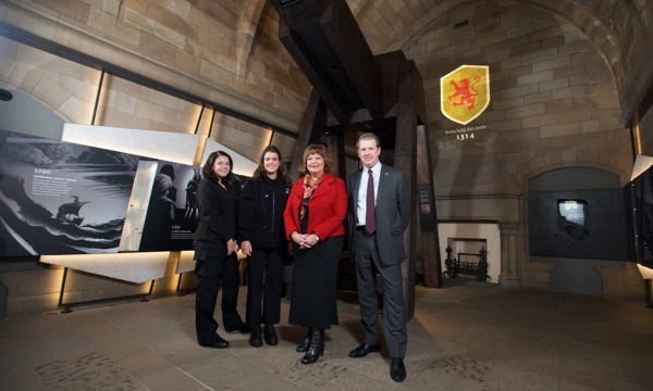 Fiona Hyslop and Alex Paterson with HES Modern Apprentices, Ellen Denholm and Lucy McLean at the new exhibition in the Argyle Tower, Edinburgh Castle