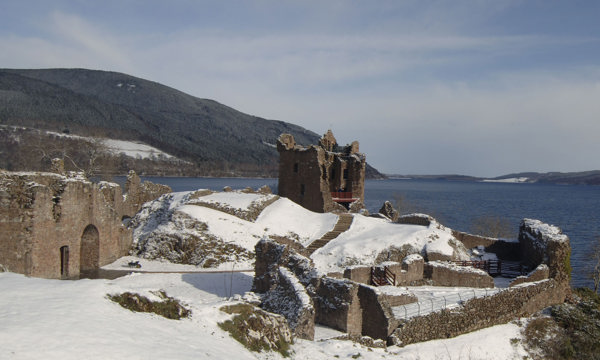 Snow covered Urquhart Castle on Loch Ness