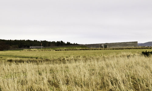 View east from Culwhiniac enclosure to the south end of the Hanoverian line and the Culloden visitor centre.