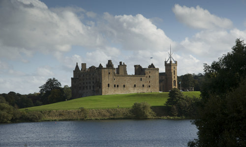A view to Linlithgow Palace across Linlithgow peel and loch