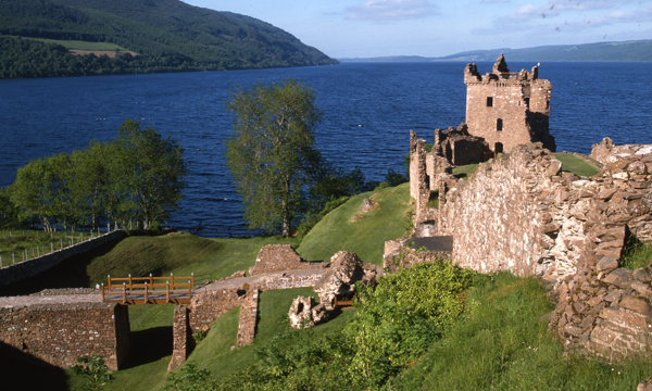 Urquhart Castle in summer with Loch Ness in the background