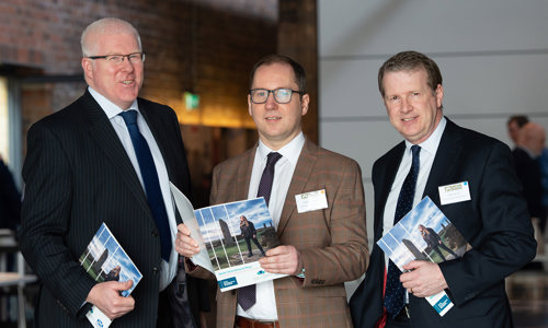 Left to Right Gordon McGuinness and Stephen Sheridan from Skills Development Scotland and Alex Paterson from Historic Environment Scotland, each holding a copy of the plan 