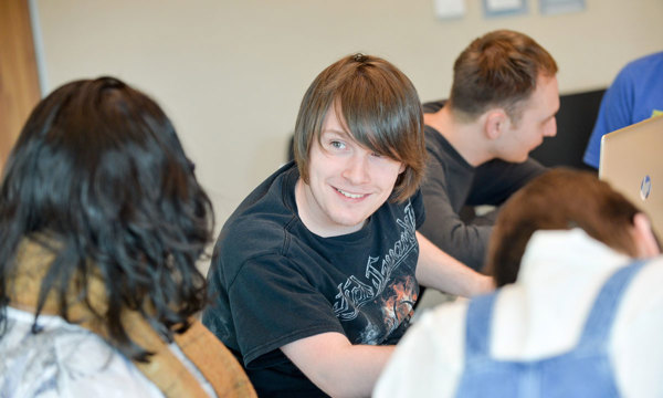 A group of young people work together on a local heritage project.