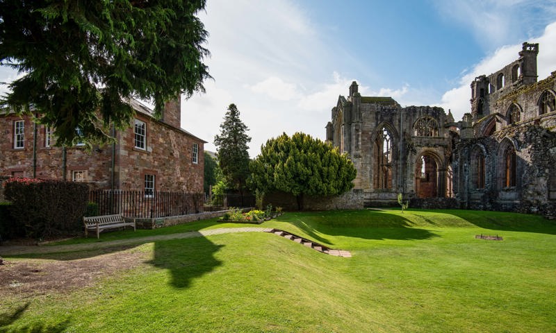 External view of Cloister House with Melrose Abbey and grounds