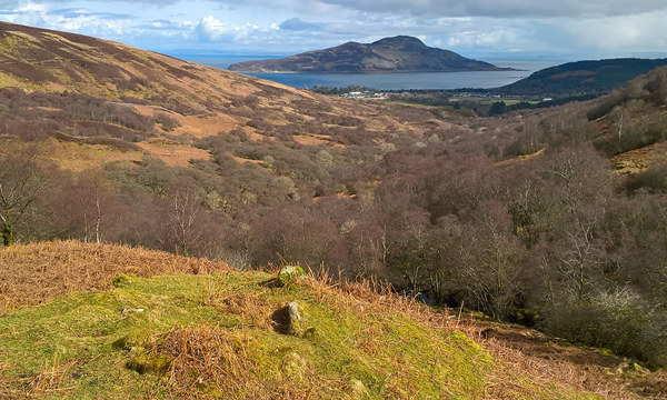 The ruins of a small shepherds hut in Blenlister Glen looking down towards Holy Island