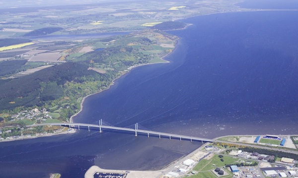Aerial view of the Kessock Bridge. A modern bridge crossing river with two supports.
