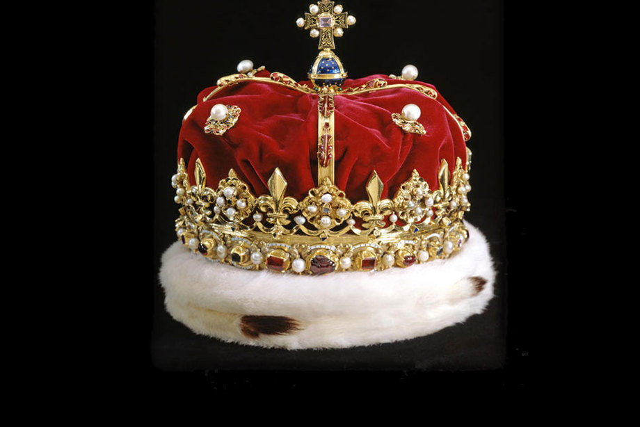 A red crown with gold embellishments and a white fur trim.