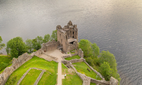Aerial view of Urquhart Castle and Loch Ness