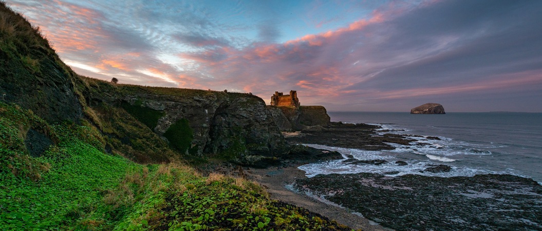 Tantallon Castle in the pinky sunset