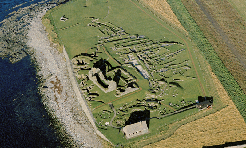 An aerial photo of a coastal Neolithic settlement