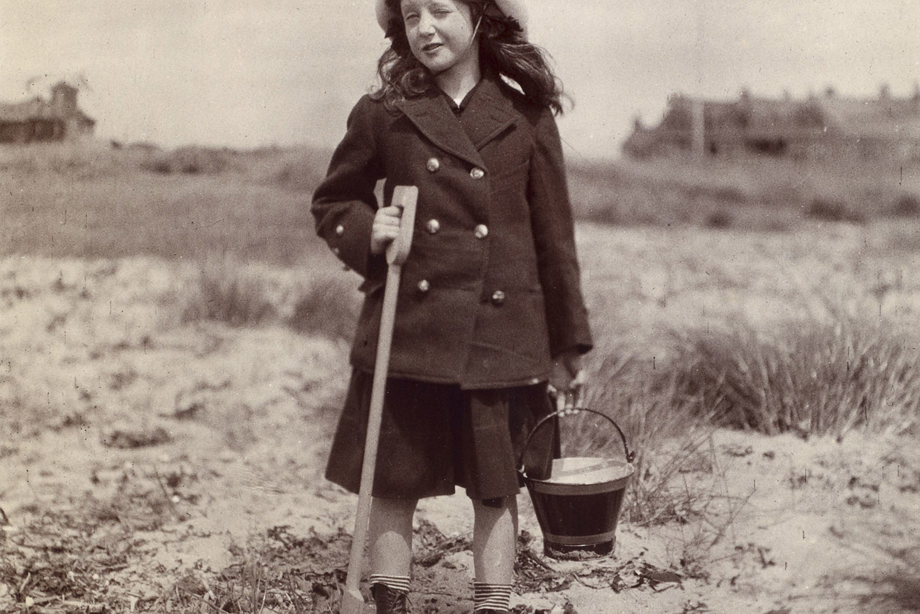 Photograph of girl on a beach. PHOTOGRAPH ALBUM NO 93 : THE STRANG COLLECTION, "SUNSHINE AND SHADE"