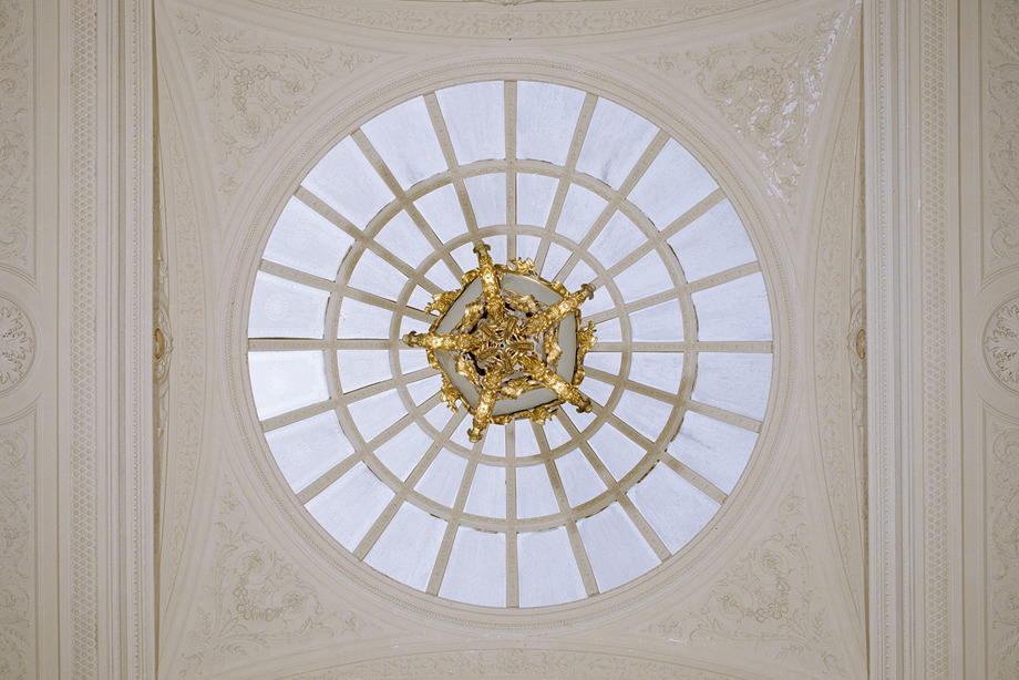 A round cupola with an ornate, gold centre