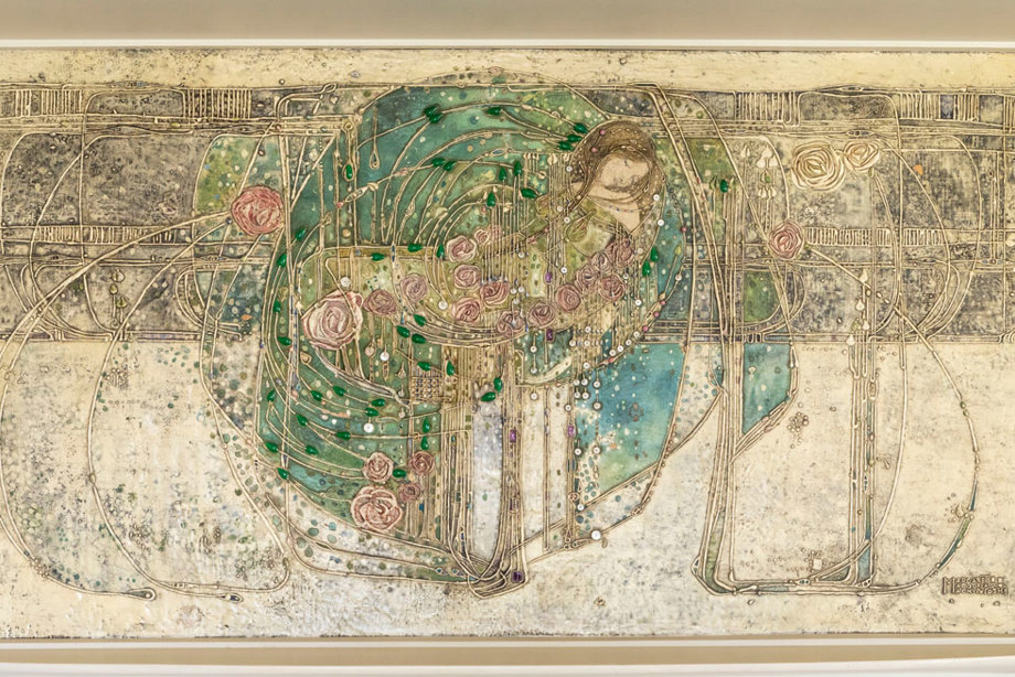 A gesso painting of a woman sleeping, and abstract rose designs