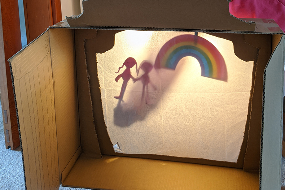 A cardboard box made into a puppet theatre