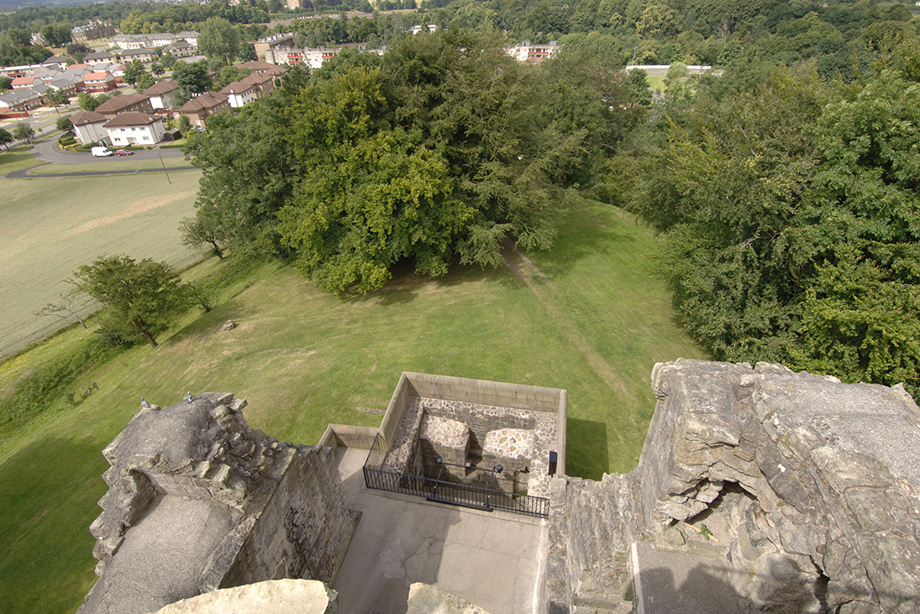 A view looking down into an unroofed castle 