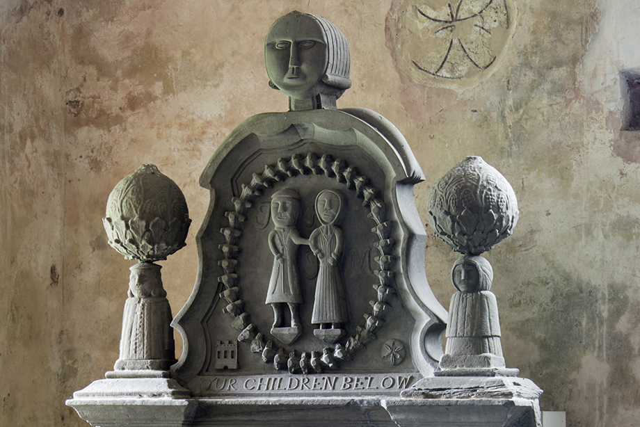 An ornate grave stone