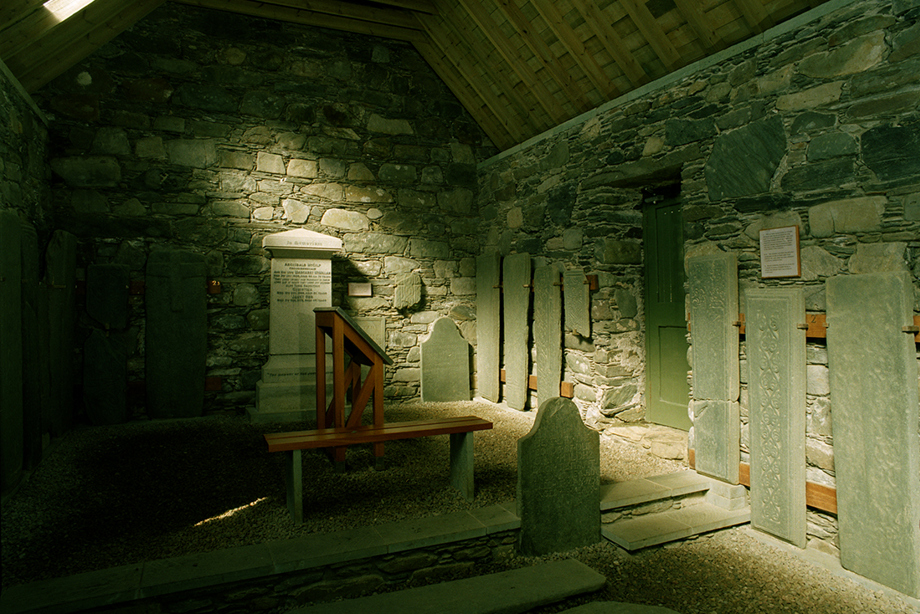A small room full of carved stone slabs