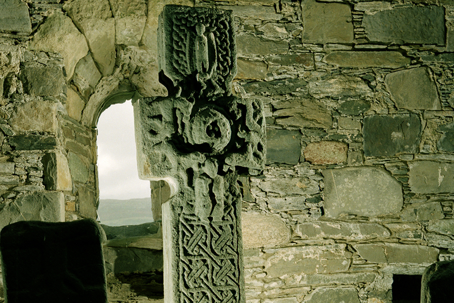 A heavily decorated carved stone cross