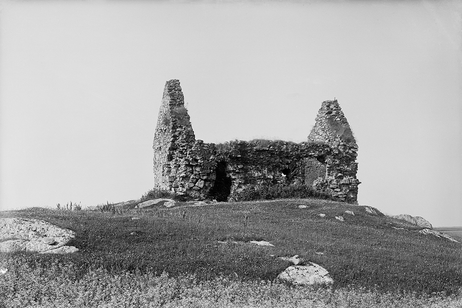 A ruined, roofless chapel