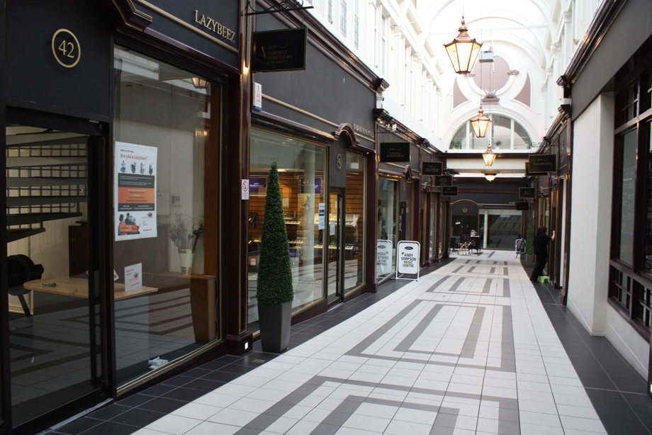 Stirling Arcade, with rows of brown shopfronts
