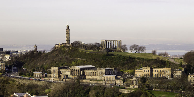 General view of Calton Hill, Dugald Stewart Monument, Nelson Monument, National Monument and the former Royal High School from Salisbury Crags, Holyrood Park