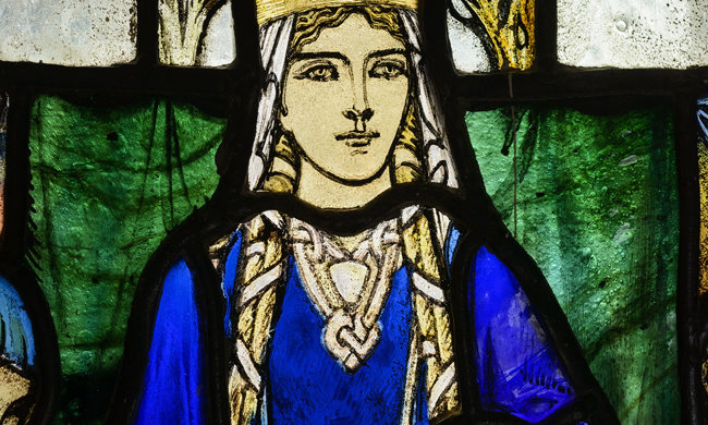 Stained glass window depicting St Margaret