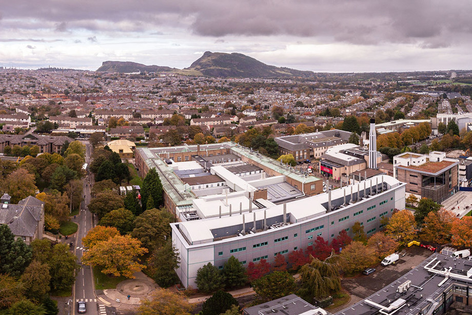 An aerial view of a university building in the autumn