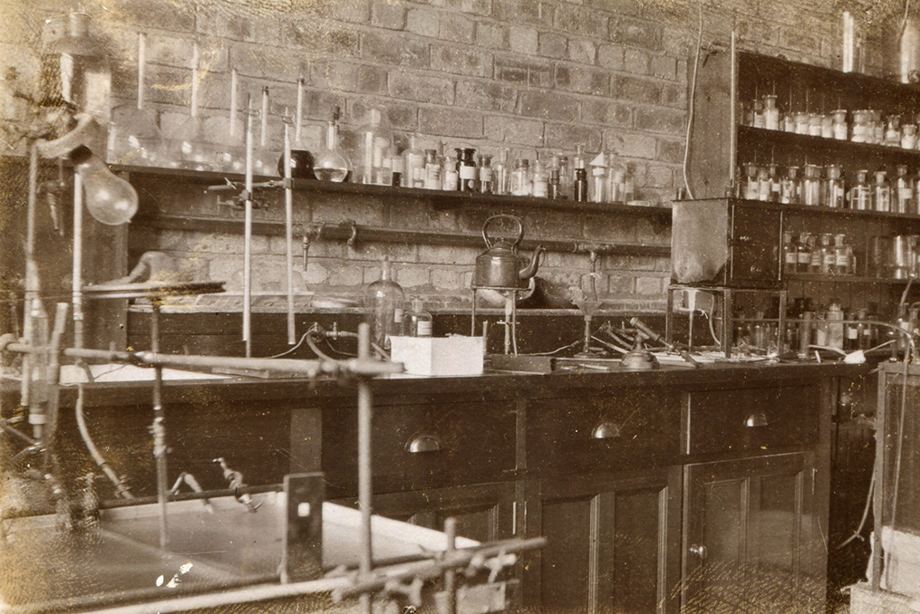 A laboratory full of glass vials, jars and kettles.