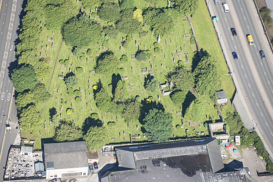 An aerial view of a churchyard