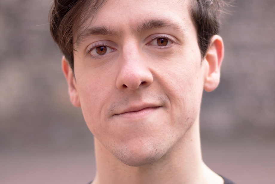 Gordon Houston smiling, wearing a green top