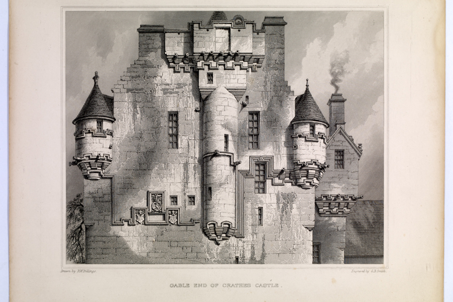 A stone castle with circular turrets