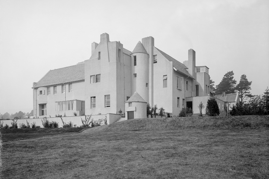 A large square building with round turrets