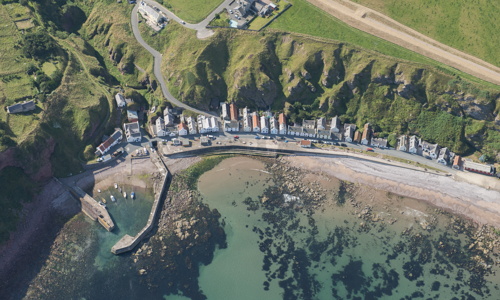 aerial image of a small fishing village