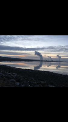 Reflections of steam from cooling towers