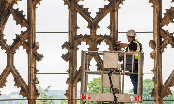 High level inspections taking place on a cherry picker at Melrose Abbey