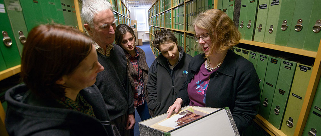 HES staff visiting the archive at the library in John Sinclair House for a tour