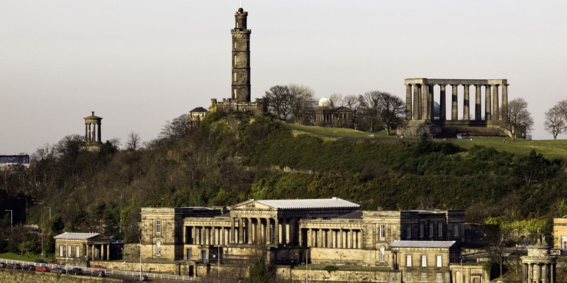 Landscape photo of view on Calton Hill and its historic monuments 