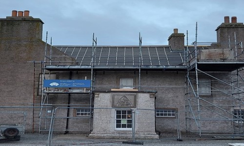 A building exterior with scaffolding on it