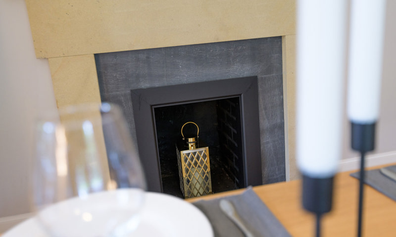 Dining room fireplace with candle lantern