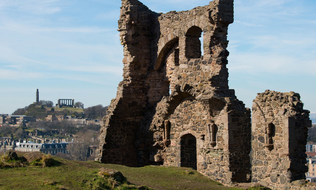 A historic chapel ruin in a park