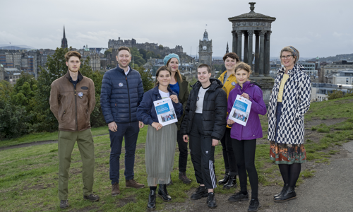 four young people and two representatives from Young Scot and two representatives from HES pictured in front of the National Monument on Calton Hill